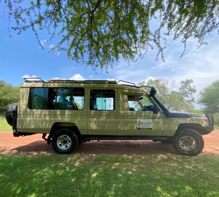 Safari vehicle on game drive