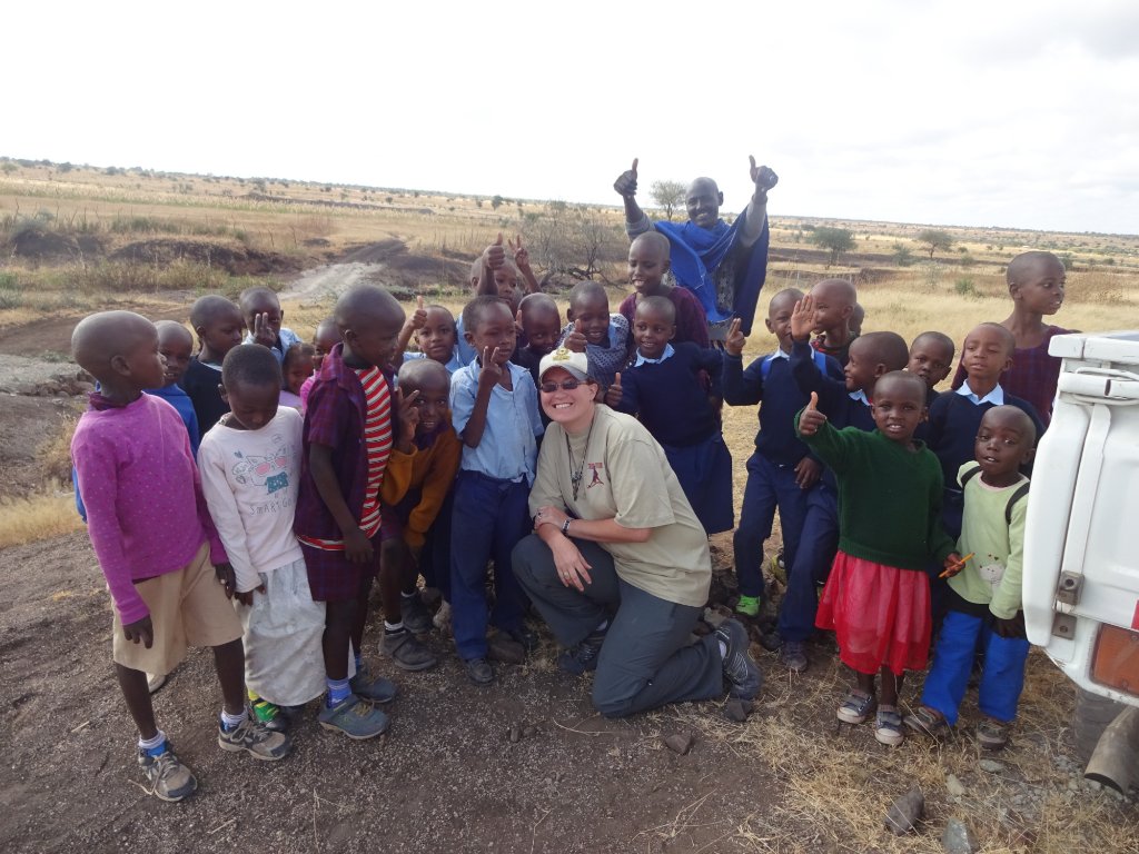 Tourist with Maasai children